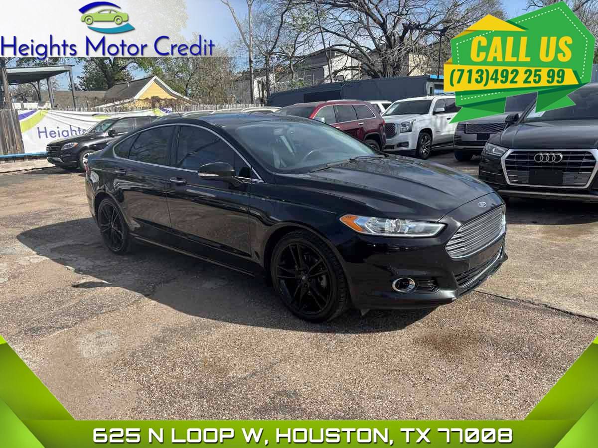2016 Ford Fusion Titanium — Sedan — 128,835 mi — Houston, TX