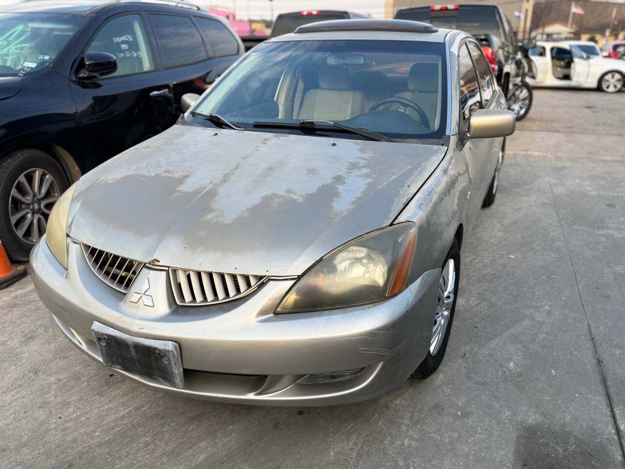 2004 Mitsubishi Lancer LS — Sedan — 176,945 mi — Houston, TX