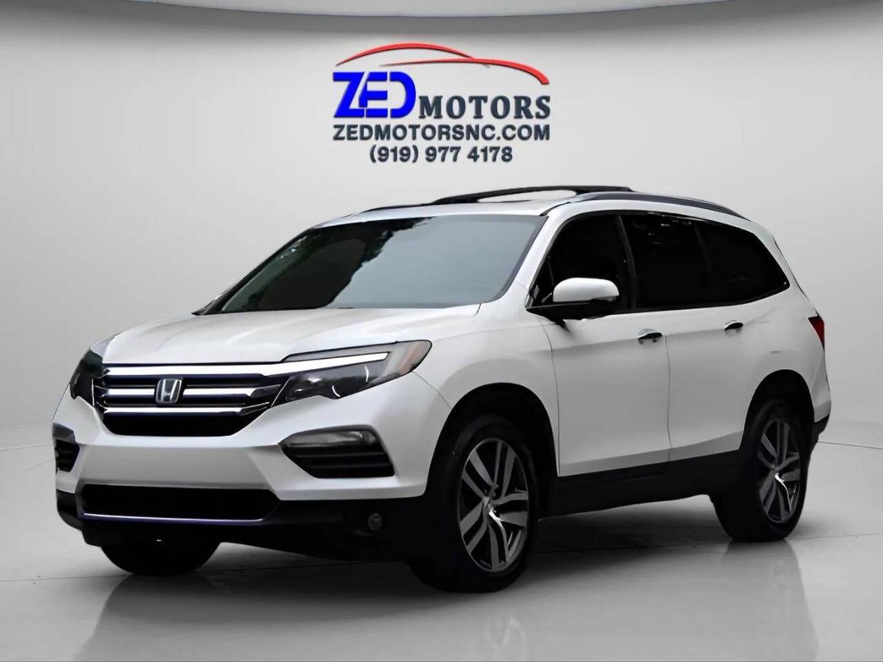 2016 Honda Pilot Touring — SUV — 128,320 mi — Raleigh, NC