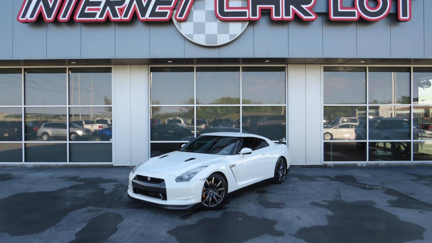 Parking Garage Nissan Gtr R Car That Has A Red Engine And Is