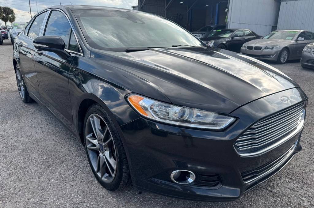 2014 Ford Fusion Titanium — Sedan — 129,698 mi — Orlando, FL