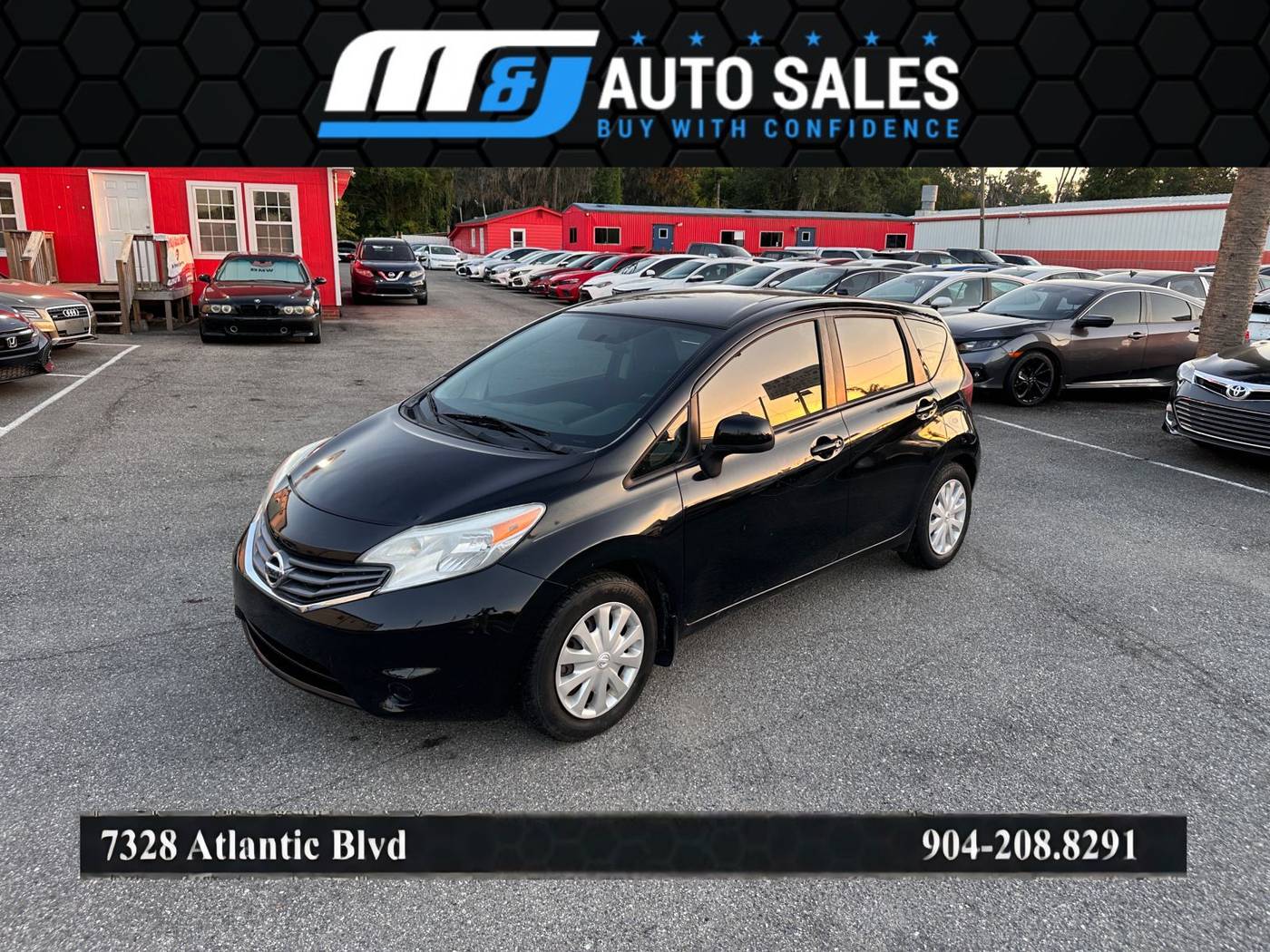 2014 Nissan Versa 1.6 SV — Hatchback — 93,819 mi — Jacksonville, FL