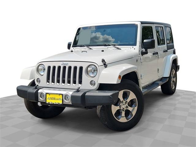 2016 Jeep Wrangler Sahara — SUV — 124,766 mi — Houston, TX