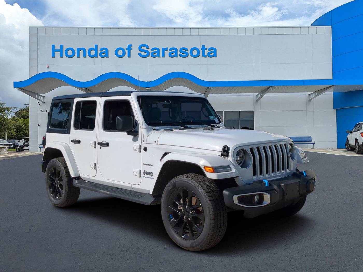 2023 Jeep Wrangler Sahara 4xe — SUV — 59,272 mi — Sarasota, FL