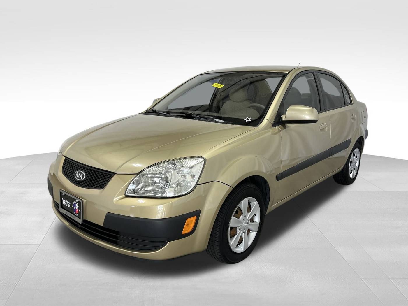 2009 Kia Rio LX — Sedan — 116,630 mi — Austin, TX