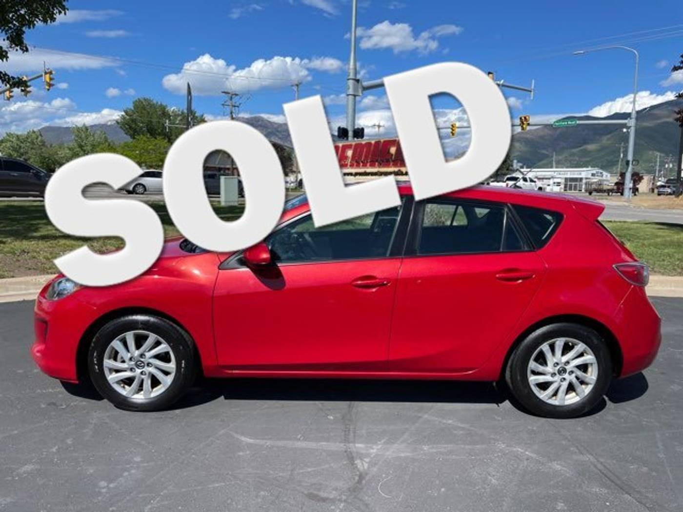 2013 Mazda Mazda3 i Touring — Hatchback — 125,974 mi — Layton, UT