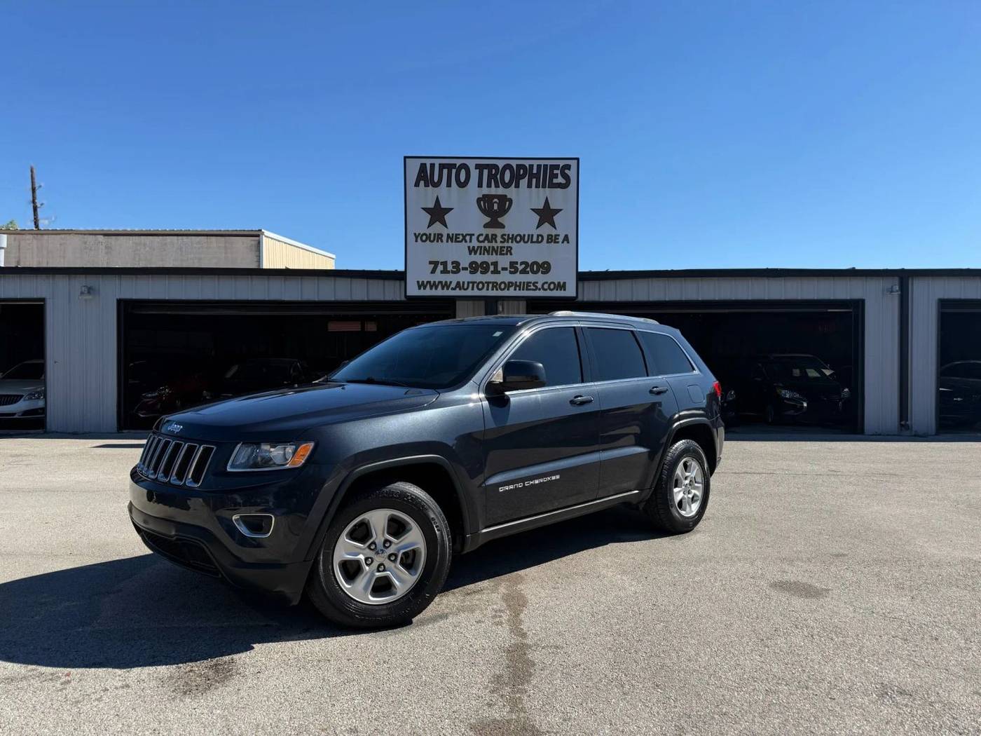 2014 Jeep Grand Cherokee Laredo — SUV — 93,577 mi — Houston, TX