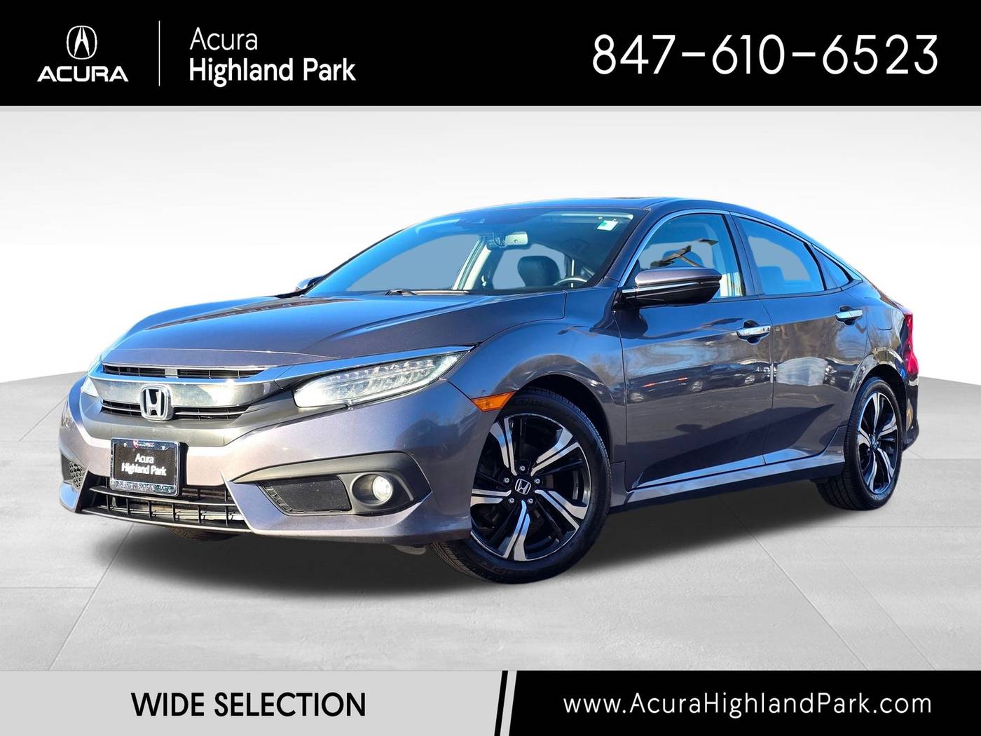 2016 Honda Civic Touring — Sedan — 128,312 mi — Highland Park, IL