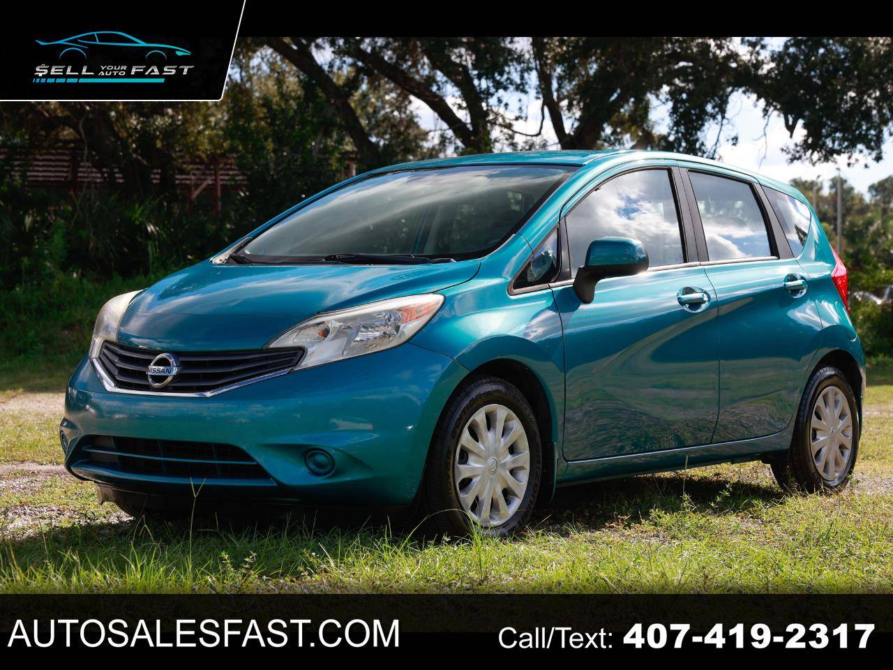 2014 Nissan Versa 1.6 SV — Hatchback — 137,355 mi — Orlando, FL