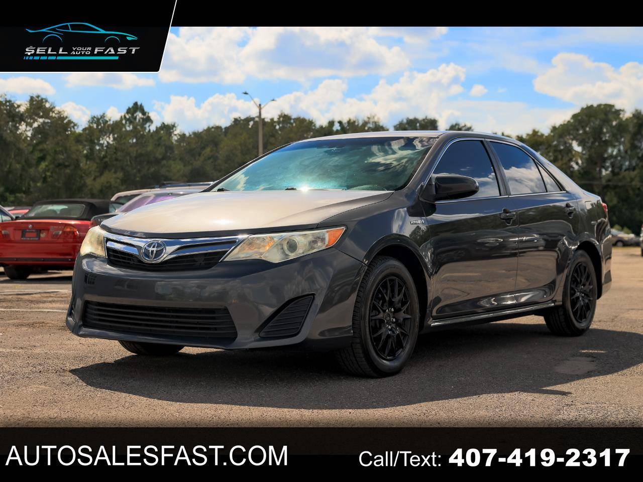 2014 Toyota Camry Hybrid LE — Sedan — 210,599 mi — Orlando, FL
