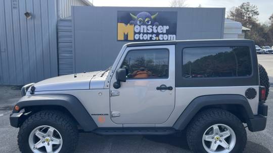 Pre-Owned 2013 Jeep Wrangler Unlimited Sahara Sport Utility in Afton  #UET1401A