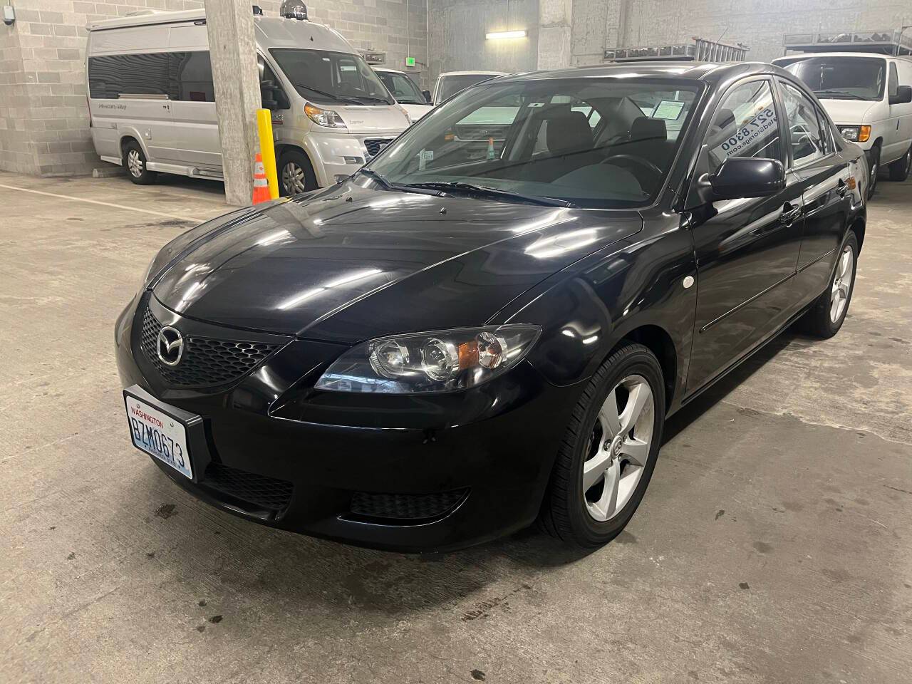 2006 Mazda Mazda3 i Touring — Sedan — 94,391 mi — Seattle, WA