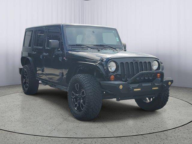 2011 Jeep Wrangler Sahara — SUV — 124,961 mi — Fort Myers, FL