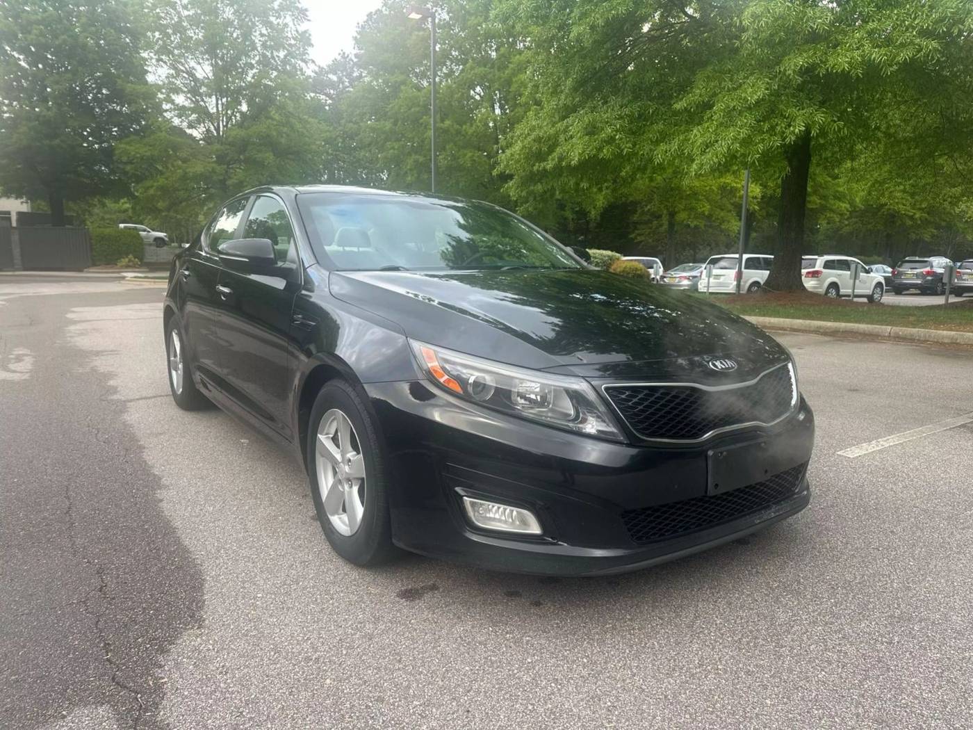 2014 Kia Optima LX — Sedan — 185,399 mi — Raleigh, NC