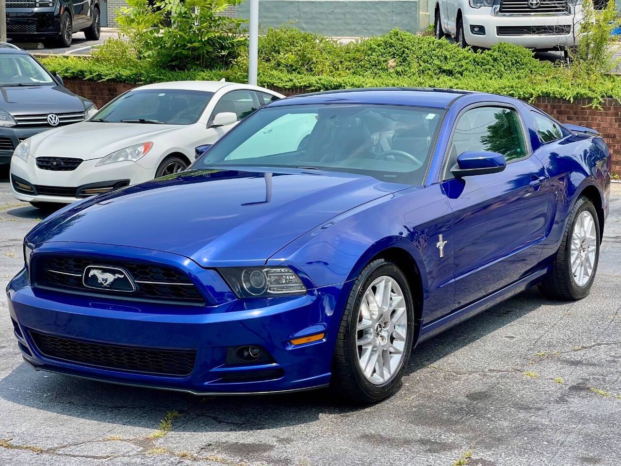 2014 Ford Mustang V6 Premium — Coupe — 130,922 mi — Raleigh, NC