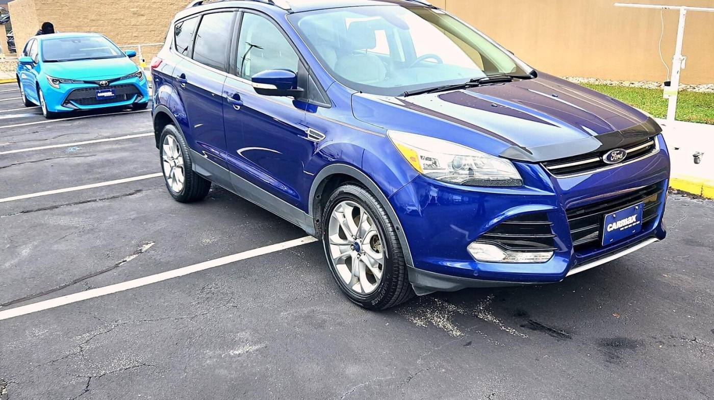 2014 Ford Escape Titanium — SUV — 76,857 mi — Houston, TX