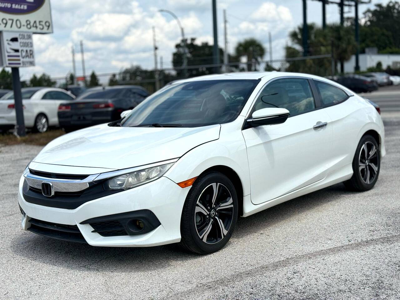 2016 Honda Civic Touring — Coupe — 57,814 mi — Orlando, FL