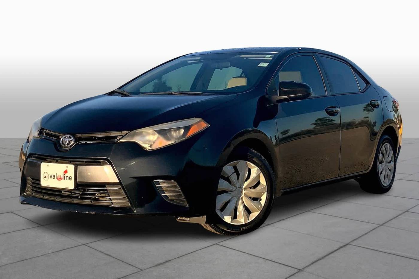 2015 Toyota Corolla LE — Sedan — 128,676 mi — Houston, TX