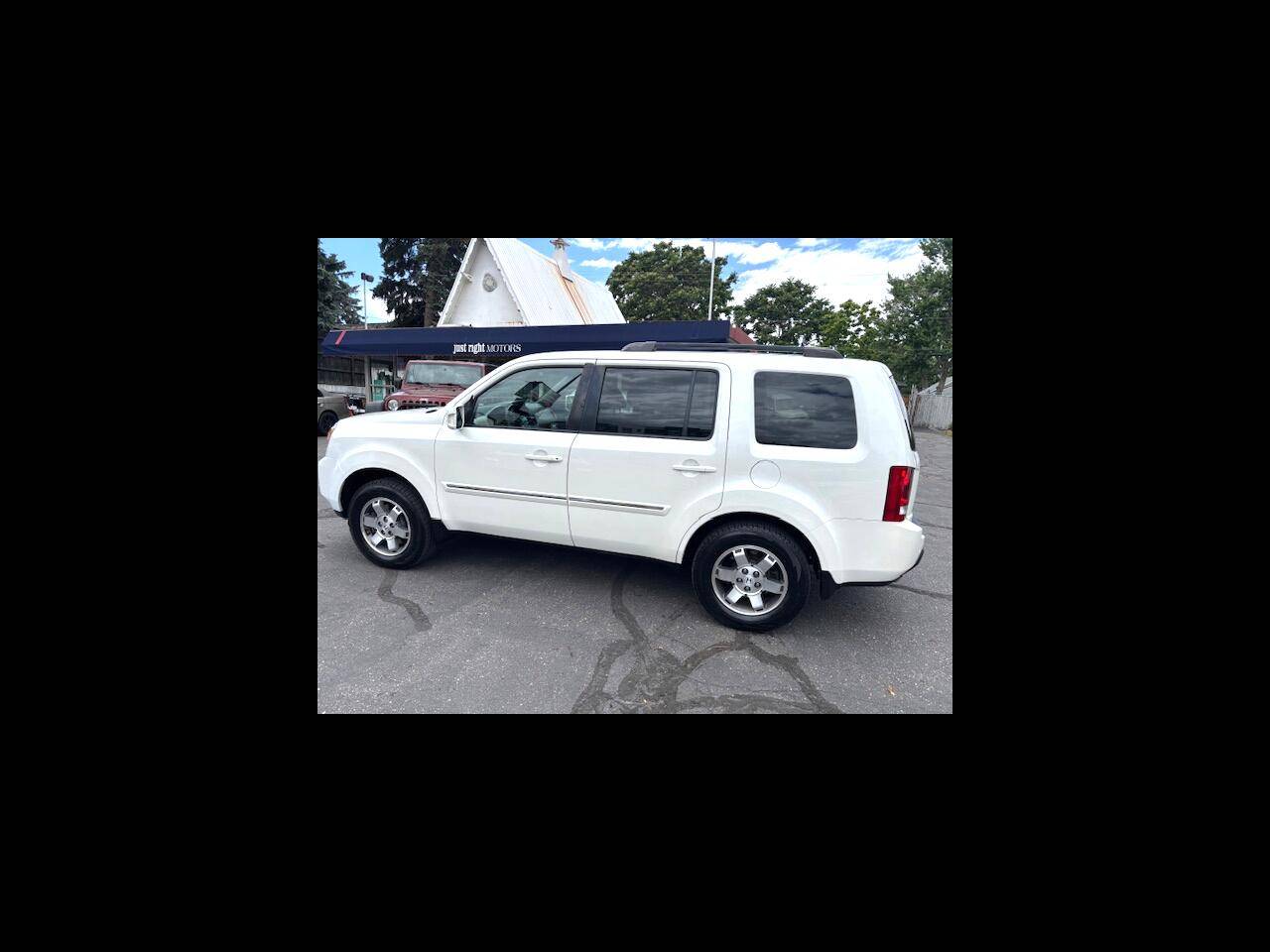 2011 Honda Pilot Touring — SUV — 135,312 mi — Englewood, CO