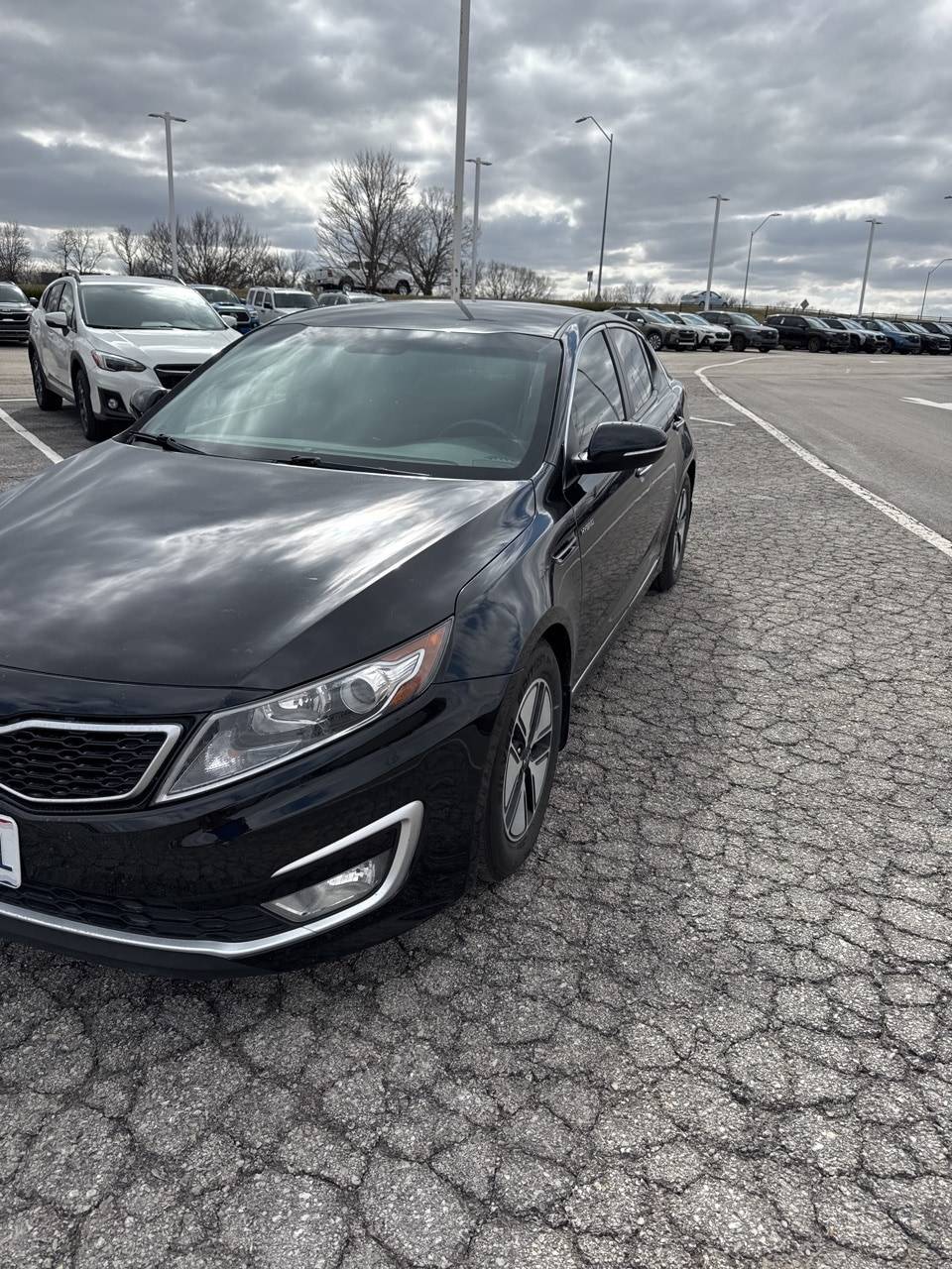 2013 Kia Optima Hybrid LX — Sedan — 100,142 mi — Kansas City, MO