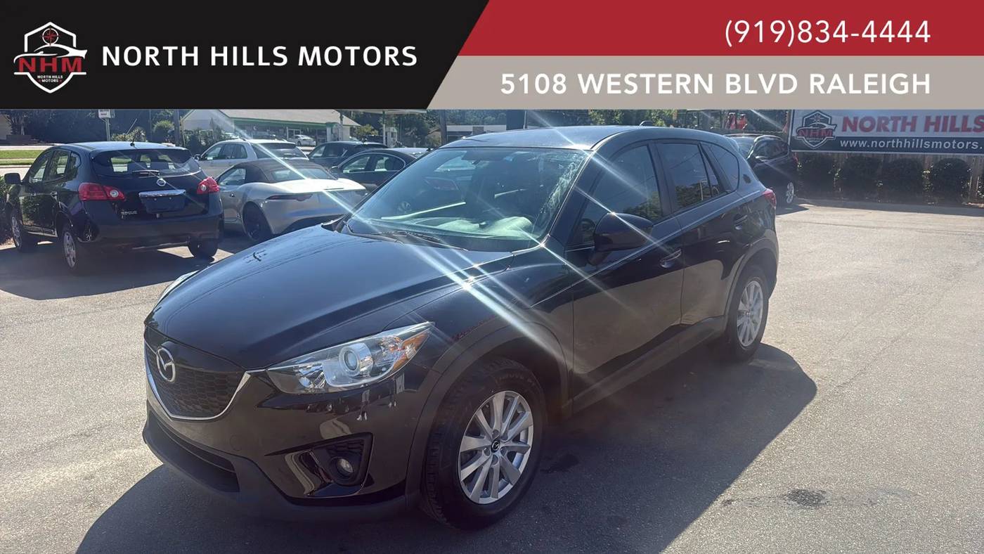 2014 Mazda CX-5 Touring — SUV — 123,324 mi — Raleigh, NC