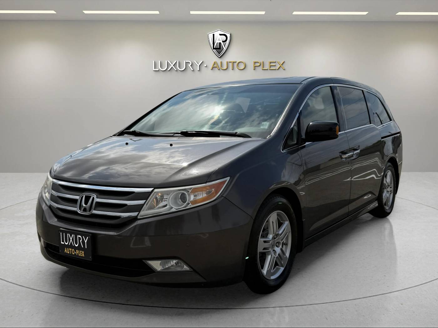 2012 Honda Odyssey Touring — Minivan — 133,199 mi — Portland, OR