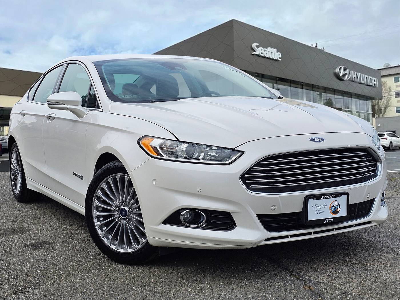 2014 Ford Fusion Hybrid Titanium — Sedan — 144,386 mi — Seattle, WA