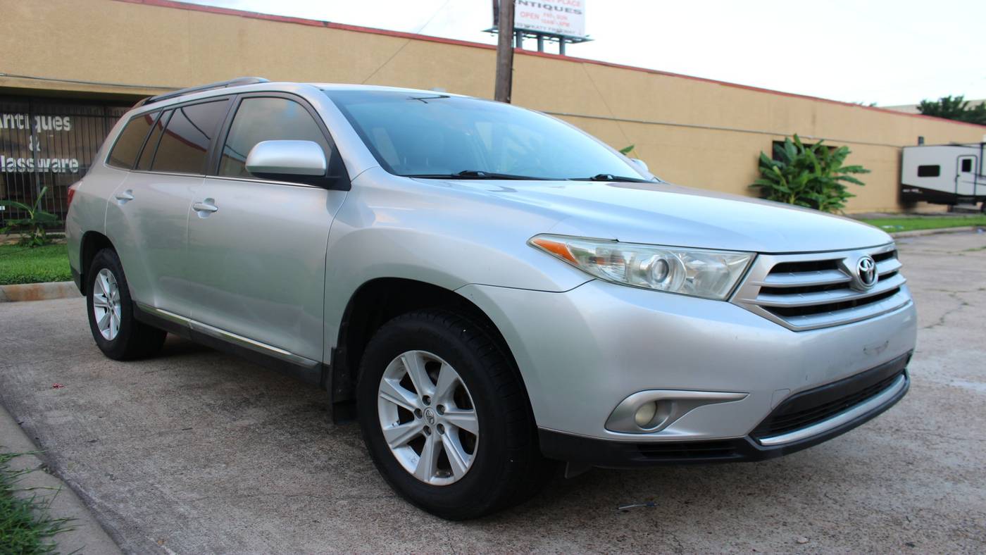 2013 Toyota Highlander SE V6 — SUV — 145,103 mi — Houston, TX