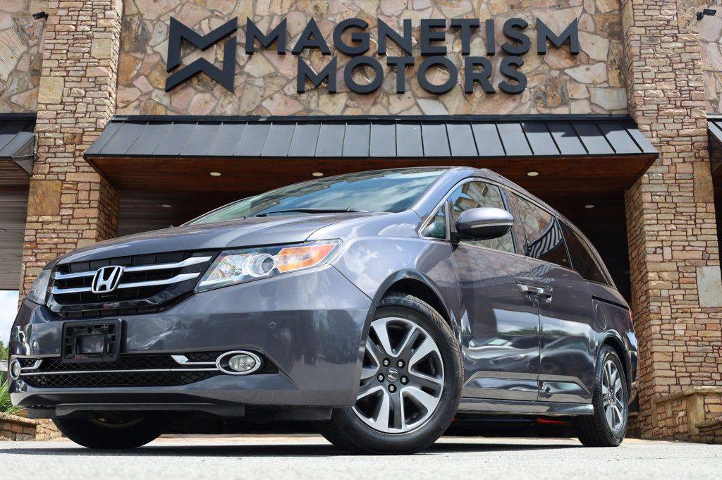 2014 Honda Odyssey Touring — Minivan — 126,303 mi — Lawrenceville, GA