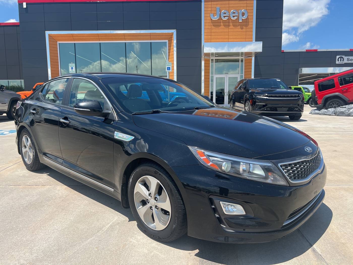 2014 Kia Optima Hybrid LX — Sedan — 142,085 mi — Shawnee, OK